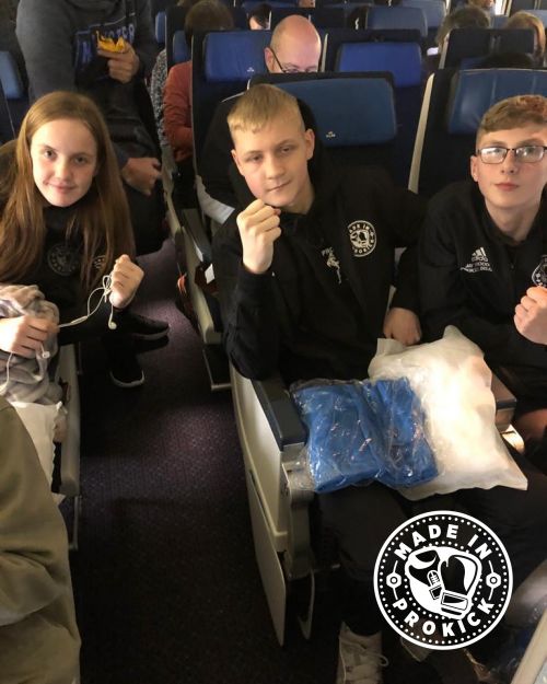 Prokick teens on the plane to Japan.