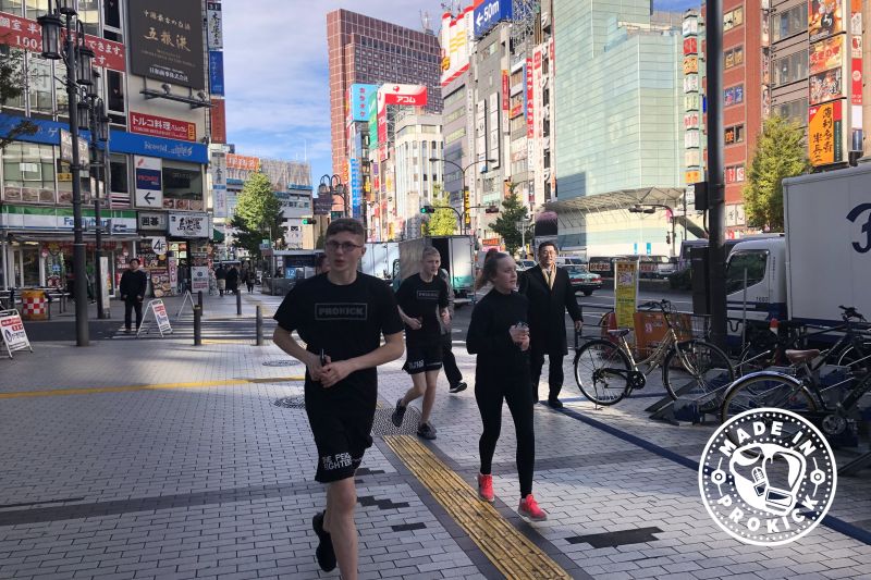 Running through the streets of downtown Tokyo